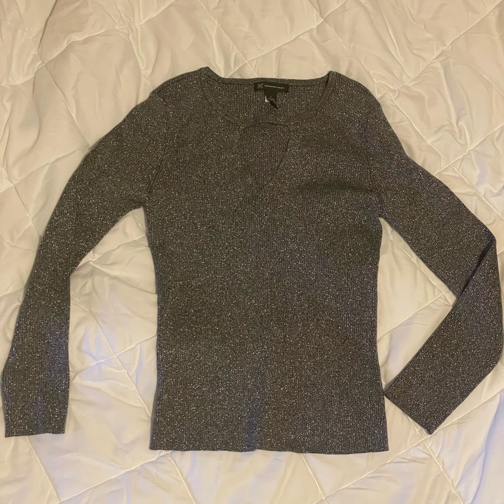 INC International Concepts long sleeved sleek top. Silver metallic knit. Size L.